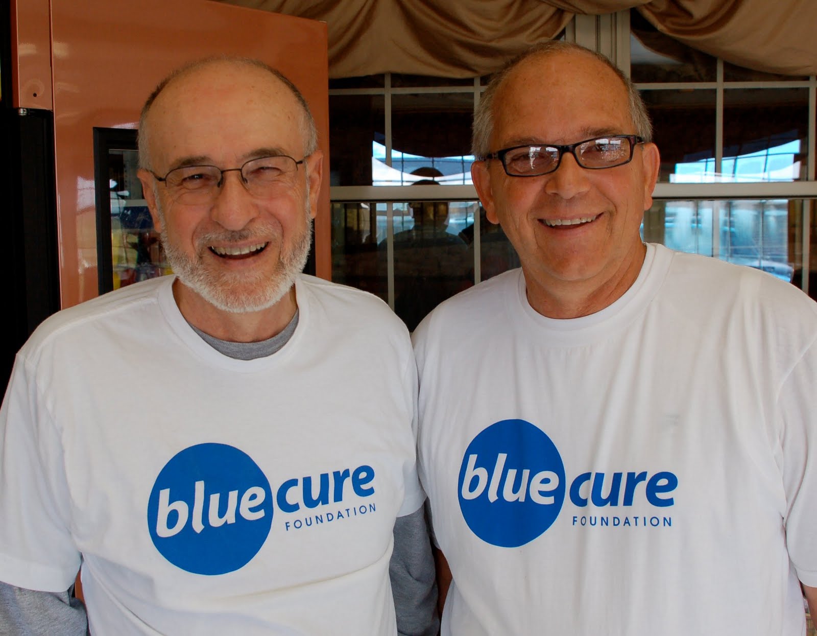 Supporters in Blue Cure shirts